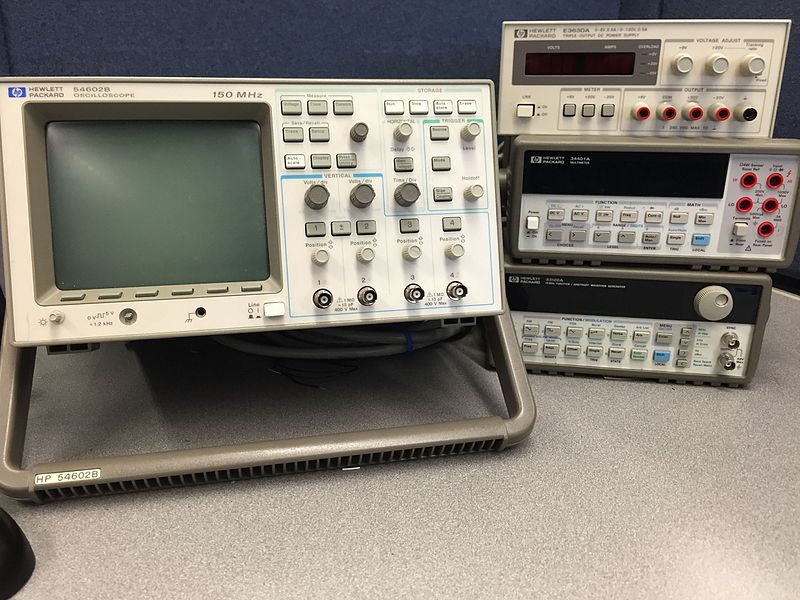 HP test equipment stack at Portland Community College featuring HP 33120A function generator